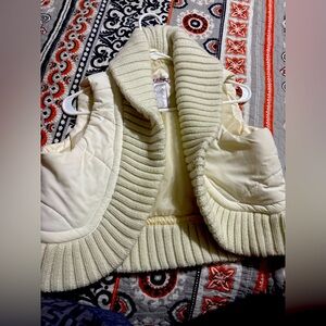 This is a white vest never been used size large in kids